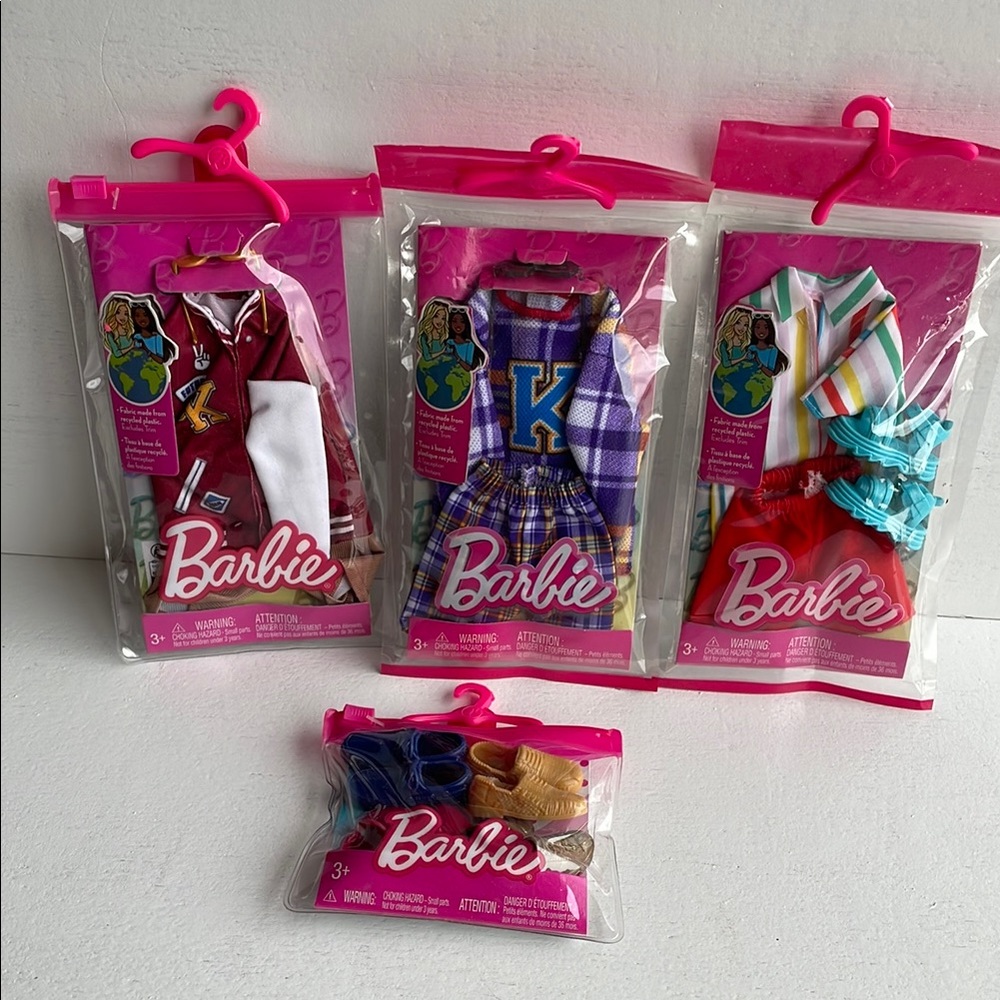 Bundle of Barbie Ken outfit and shoes.